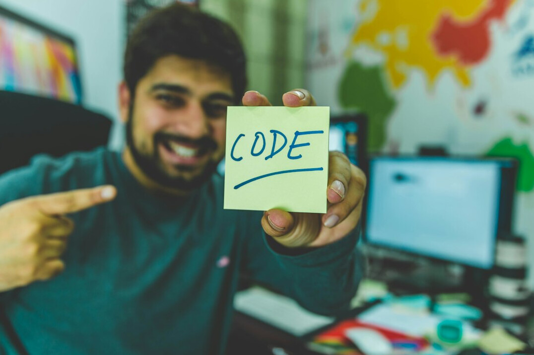 young programmer celebrating success